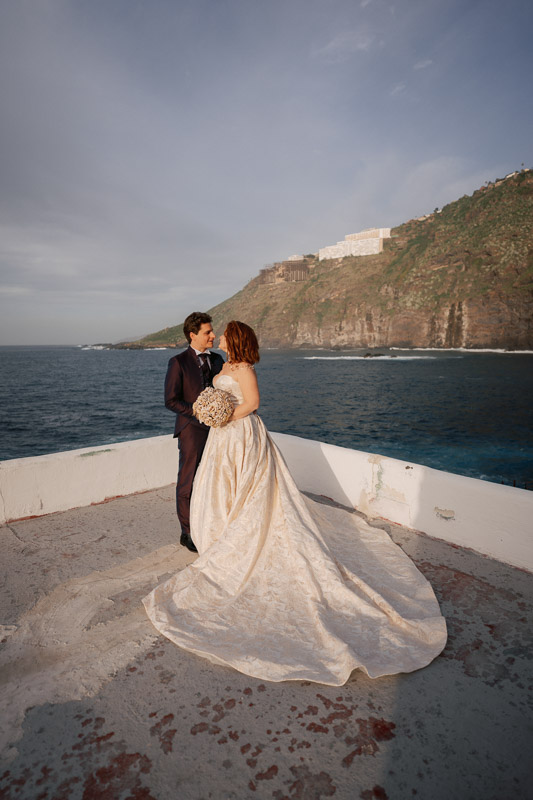 Couple having a photoshoot after their elopement ceremony in El Caleton, Tenerife.